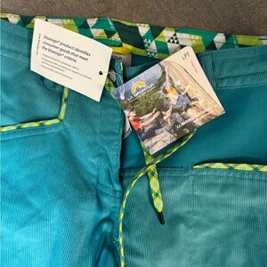 New with tags women La Sportiva long pants with Yellow Trim, size medium